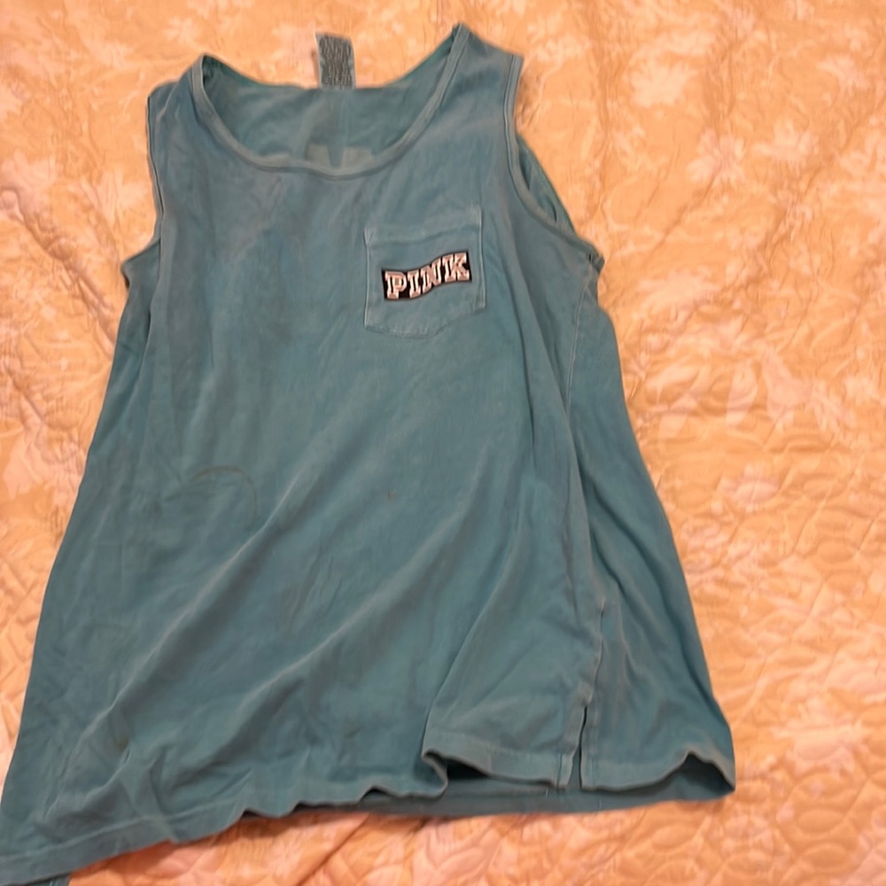 This is a PINK Tank top and the Size is a Small